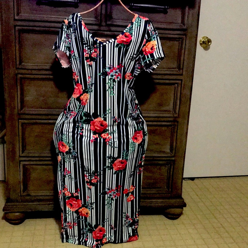Blue dress with stripes white and roses.
